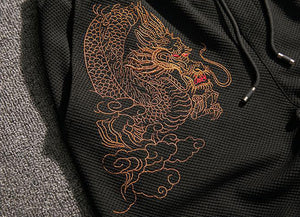 Carbon black Tang Dynasty inspired sweatpants dragon design