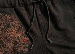 Carbon black Tang Dynasty inspired sweatpants dragon design