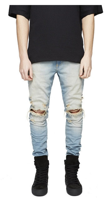 Distressed skinny ripped jeans